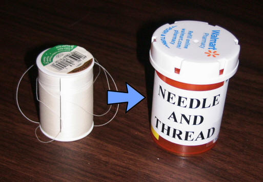 Needle and thread in pill bottle